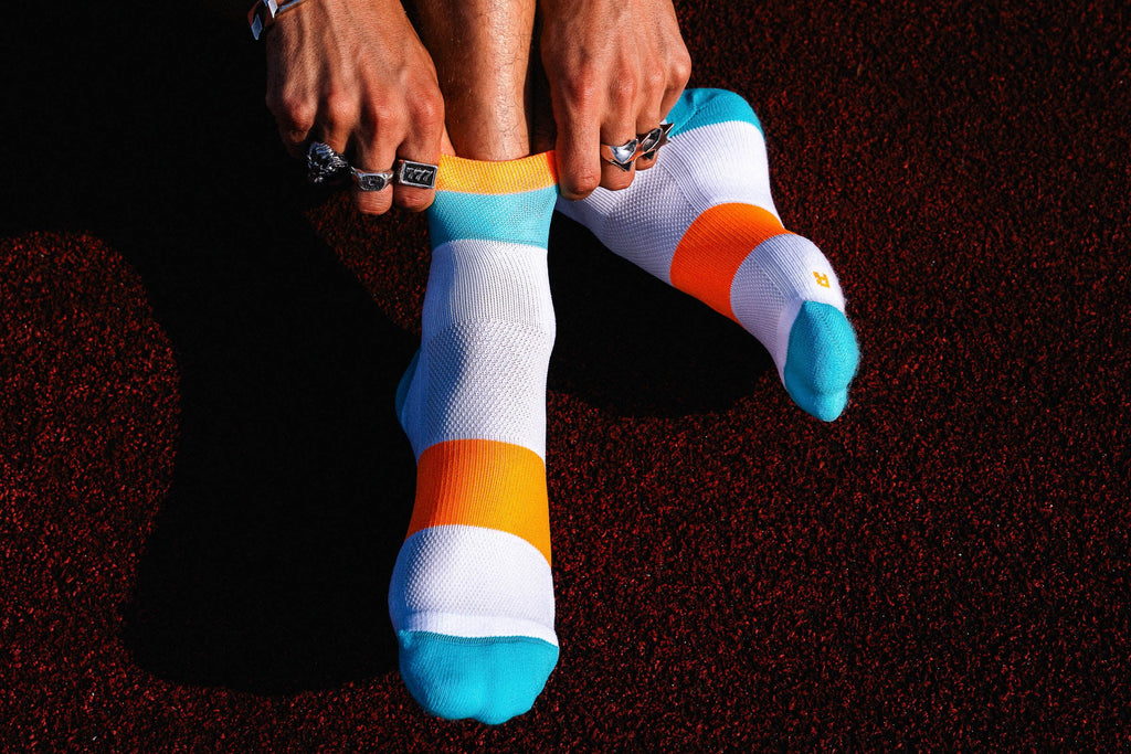 인사일런스 러닝 밴즈 쇼트 사이언-오렌지 INCYLENCE RUNNING BANDS SHORT CYAN ORANGE
